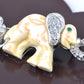 Elements Sapphire Eyed Pearlescent Paint Elephants Pin Brooch