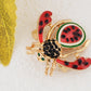 Alilang Elegant Crystal Rhinestone Fruit and Bee Brooch - Fashionable Gold Plated Fruit Insect Lapel Pins for Dresses and Accessories