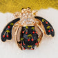 Alilang Elegant Crystal Rhinestone Fruit and Bee Brooch - Fashionable Gold Plated Fruit Insect Lapel Pins for Dresses and Accessories