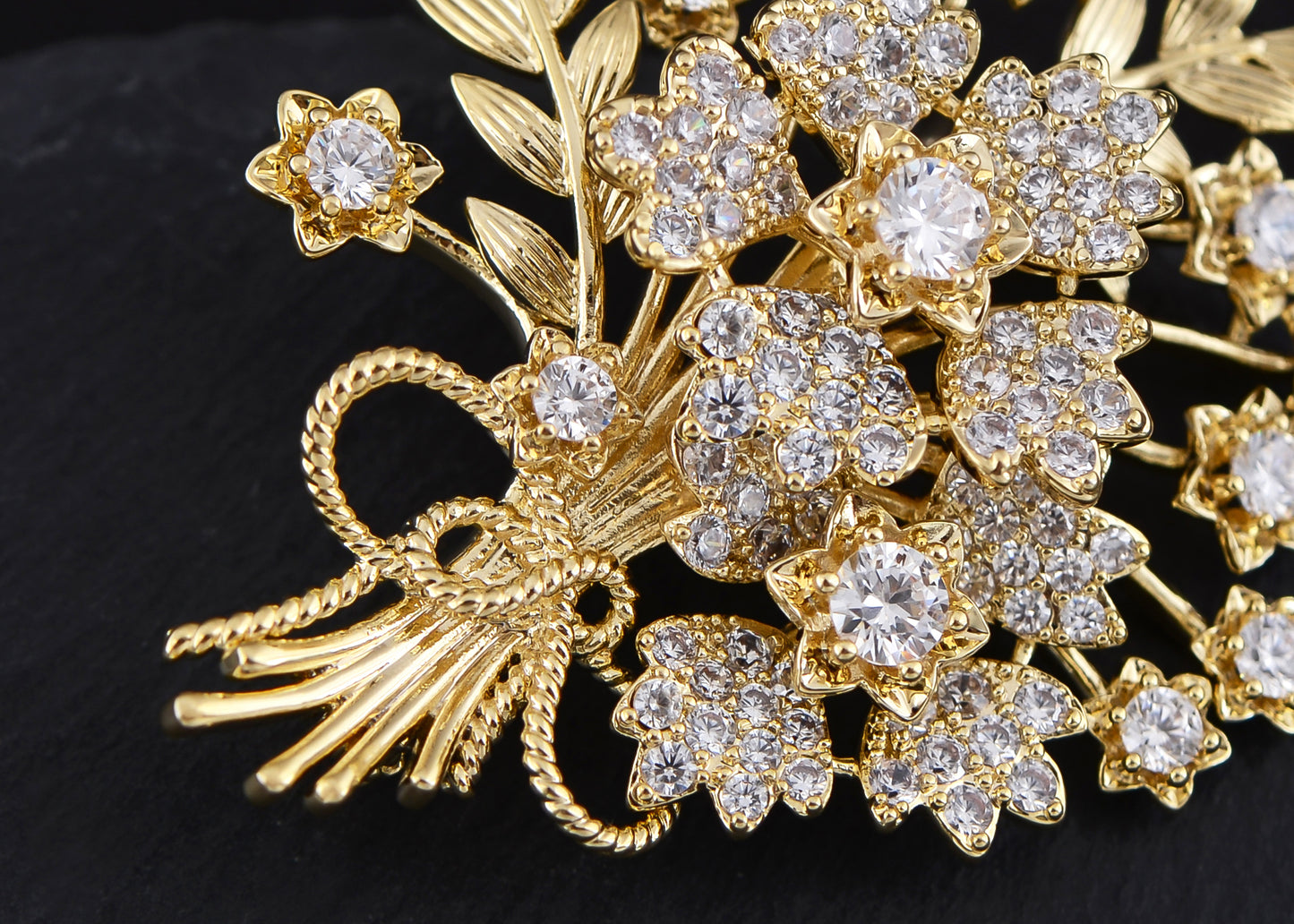 Aliang Women Gold Tone Floral Bouquet Brooch with Clear Rhinestone Textured Leaf and Bow Details