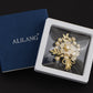 Aliang Women Gold Tone Floral Bouquet Brooch with Clear Rhinestone Textured Leaf and Bow Details