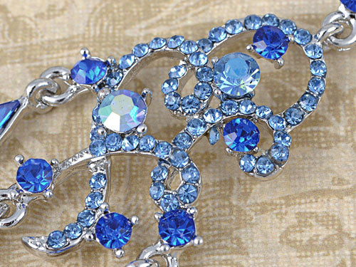 Silver Sapphire Blue Colored Sea Swirl Waves Dangle Earrings