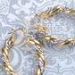Two Gold Silver Intertwining Oval Shaped Hoop Earrings