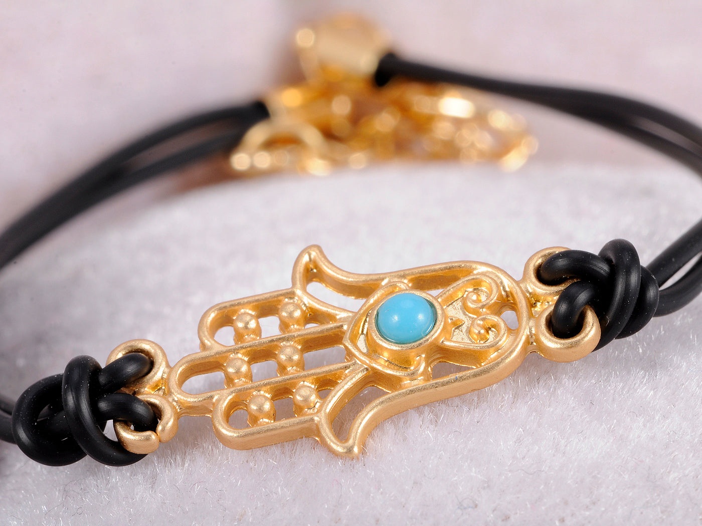 Intricate Carved Hamsa Charm Holding Blue Bead Palm Black String Bracelet